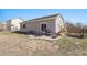 Backyard view with a patio and seating area, offering a relaxing outdoor space at 19302 E 58Th Pl, Aurora, CO 80019