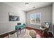 Bright office space with desk, chair, and natural light from a window at 19302 E 58Th Pl, Aurora, CO 80019