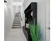 Inviting entryway with custom storage solutions and modern design elements at 6212 Kilmer Loop # 202, Golden, CO 80403