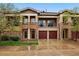 Inviting townhome with stone accents, upper balcony, and two-car garage at 6212 Kilmer Loop # 202, Golden, CO 80403