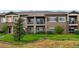 Multi-Gathering home with private balconies, complemented by well-maintained landscaping at 6212 Kilmer Loop # 202, Golden, CO 80403