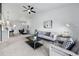 Bright and airy living room with vaulted ceilings, contemporary decor and open floor plan at 6212 Kilmer Loop # 202, Golden, CO 80403