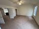 Spacious bedroom with vaulted ceiling and ceiling fan at 10129 Grove Ct # B, Westminster, CO 80031