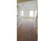Bright bedroom with neutral carpeting and multiple windows offering natural light at 10129 Grove Ct # B, Westminster, CO 80031