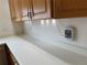 Kitchen countertop with wood cabinets at 10129 Grove Ct # B, Westminster, CO 80031