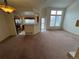 Open concept living room and kitchen area with lots of natural light at 10129 Grove Ct # B, Westminster, CO 80031