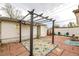 Backyard featuring a pergola, patio, and outdoor seating area perfect for entertaining or relaxing at 3001 Benton St, Wheat Ridge, CO 80214