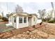 Charming home featuring a rock garden, brick accents, and inviting front entrance at 3001 Benton St, Wheat Ridge, CO 80214