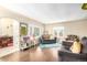 Open living room with hardwood floors and views to other rooms at 3001 Benton St, Wheat Ridge, CO 80214