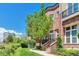 Beautiful brick townhome with landscaped front yard and inviting entrance in a desirable neighborhood at 5426 Dtc Pkwy, Greenwood Village, CO 80111