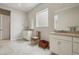 Bathroom featuring dual vanities, a soaking tub, and a separate walk-in shower with modern fixtures and gray decor at 5622 Shadescale Way, Castle Rock, CO 80104