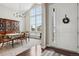 Elegant dining room with tall windows, beautiful furnishings, and welcoming ambiance at 5622 Shadescale Way, Castle Rock, CO 80104