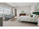 Spacious main bedroom featuring a cozy sitting area, ample natural light, and serene ambiance for relaxation at 5622 Shadescale Way, Castle Rock, CO 80104