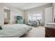 Spacious main bedroom with a sitting area and scenic views at 5622 Shadescale Way, Castle Rock, CO 80104