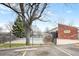 Apartment complex exterior with mature trees and community pool at 857 S Van Gordon Ct # I207, Lakewood, CO 80228