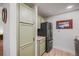 Well-organized kitchen featuring ample storage, stainless steel refrigerator, and elegant countertops at 857 S Van Gordon Ct # I207, Lakewood, CO 80228