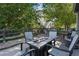 Backyard patio featuring outdoor furniture and a fire pit at 9603 Marmot Ridge Cir, Littleton, CO 80125