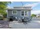 Backyard featuring a patio with outdoor furniture, grill, and string lights at 9603 Marmot Ridge Cir, Littleton, CO 80125