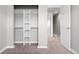 Walk-in closet with built-in shelving and ample storage space at 9603 Marmot Ridge Cir, Littleton, CO 80125