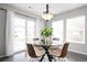 Bright dining area with natural light and a view of the backyard at 9603 Marmot Ridge Cir, Littleton, CO 80125