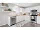 Well-equipped kitchen with stainless steel appliances and ample counter space at 9603 Marmot Ridge Cir, Littleton, CO 80125