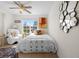 Cozy bedroom featuring a white bed, decorative mirror, and a comfortable armchair at 7501 S Addison Way, Aurora, CO 80016