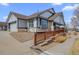 A well-kept single-Gathering residence featuring an attached garage and accessible ramp at 7501 S Addison Way, Aurora, CO 80016