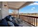 Inviting outdoor patio with comfortable seating, a glass table, and neighborhood views at 7501 S Addison Way, Aurora, CO 80016