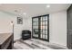 Office area featuring glass French doors and modern décor and great natural light at 10541 Routt St, Westminster, CO 80021