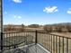 Exterior balcony with a table and chairs overlooking the surrounding scenery at 760 Century Pl # A, Monument, CO 80132