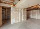 Unfinished basement with storage shelves at 760 Century Pl # A, Monument, CO 80132