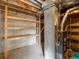 Unfinished basement with storage shelves and utility equipment at 760 Century Pl # A, Monument, CO 80132