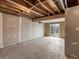 Unfinished basement with a sliding glass door to the backyard at 760 Century Pl # A, Monument, CO 80132