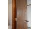 Bathroom entrance featuring a wood door adjacent to the toilet at 760 Century Pl # A, Monument, CO 80132