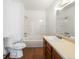 This bathroom includes a sink with cabinet and shower over tub at 760 Century Pl # A, Monument, CO 80132