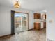 Open dining area featuring vinyl flooring and access to an outdoor deck at 760 Century Pl # A, Monument, CO 80132