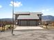 Charming two-story home with two-car garage and mountain views under a blue sky at 760 Century Pl # A, Monument, CO 80132