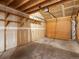 Empty garage with storage shelves and a garage door at 760 Century Pl # A, Monument, CO 80132