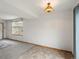 Partially carpeted living room and vinyl dining area with natural light at 760 Century Pl # A, Monument, CO 80132