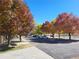 Parking lot with colorful trees in the fall at 15843 E 13Th Ave, Aurora, CO 80011