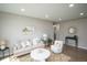 Bright and airy living room with neutral tones and modern decor at 2504 S Yates St, Denver, CO 80219