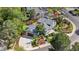 Aerial view of a home with lush landscaping, outdoor entertaining areas, and a well-manicured lawn at 4218 S Alton St, Greenwood Village, CO 80111