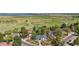 Lovely home from an aerial view, nestled by a park and lake, showcasing a peaceful, picturesque community at 4218 S Alton St, Greenwood Village, CO 80111