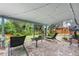 Covered patio with cozy seating offers a relaxing outdoor retreat at 4218 S Alton St, Greenwood Village, CO 80111