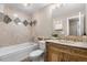 Elegant bathroom with a soaking tub, vanity, and ornate tile work at 4218 S Alton St, Greenwood Village, CO 80111