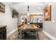 Dining room with wood table and access to living room and kitchen area at 4218 S Alton St, Greenwood Village, CO 80111