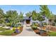 Charming home with well-maintained landscaping and mature trees, creating a welcoming entrance at 4218 S Alton St, Greenwood Village, CO 80111