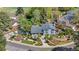 Stunning single-Gathering home showcasing mature landscaping, walkway, and a serene outdoor seating area at 4218 S Alton St, Greenwood Village, CO 80111