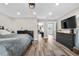 Cozy Main bedroom with wood floors, dresser and ample closet space at 4218 S Alton St, Greenwood Village, CO 80111