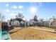 Spacious backyard featuring a gazebo, shed, and an inviting area for outdoor activities at 4389 S Sherman St, Englewood, CO 80113